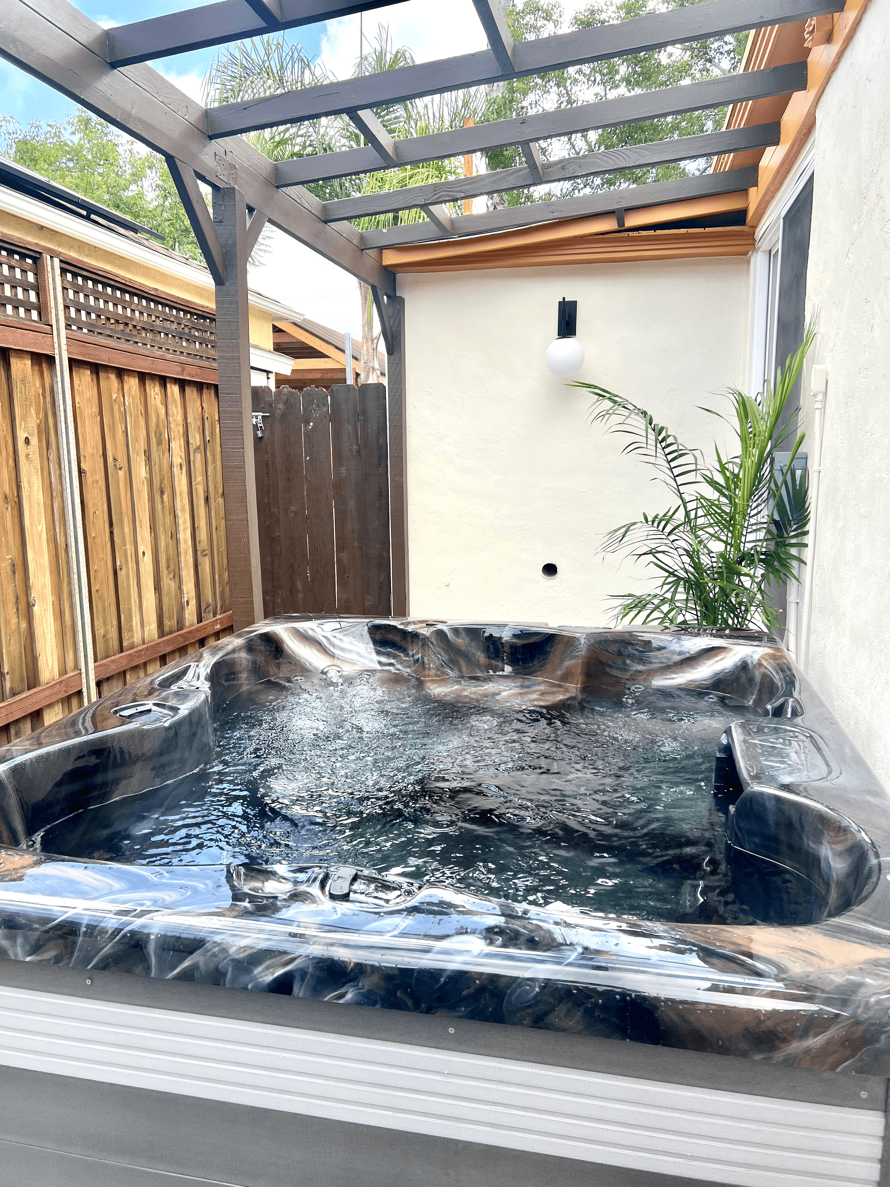 Hot tub under pergola